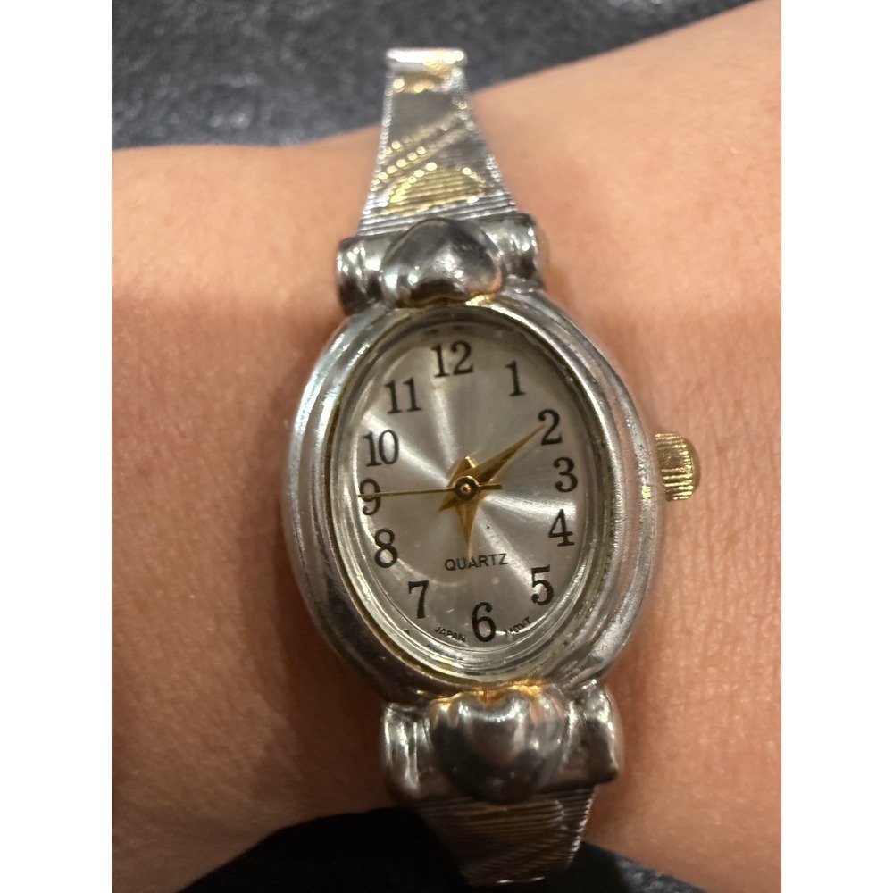 Advance ws60511w Elegant Oval Face Quartz Watch Two Tone Metal Band battery need